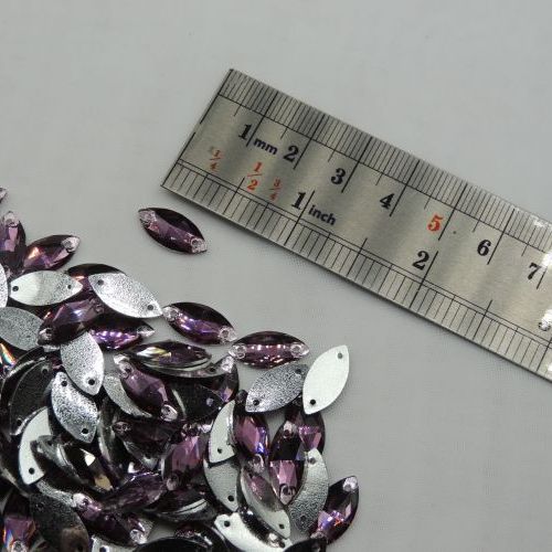 سنگ دوختنی رزینی چشمی سایز دو 