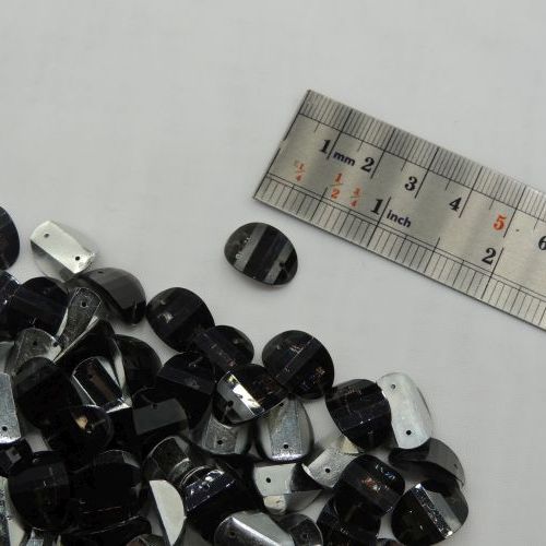 سنگ دوختنی رزینی بیضی محدب سایز سه 