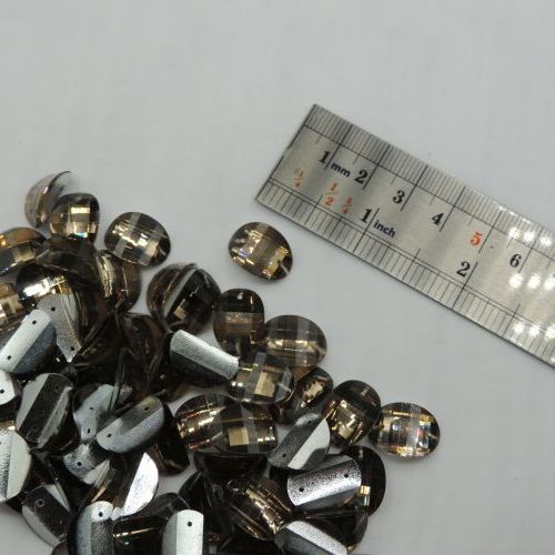 سنگ دوختنی رزینی  بیضی سایز سه 