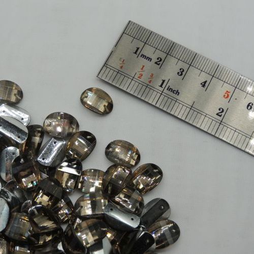 سنگ دوختنی رزینی بیضی محدب سایز دو