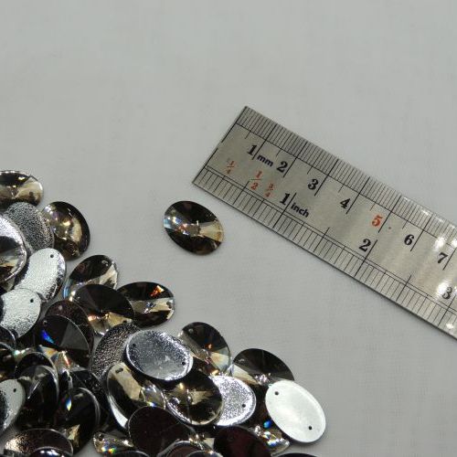 تصویر سنگ دوختنی رزینی بیضی سایز سه 