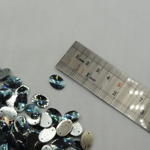 سنگ دوختنی رزینی بیضی سایز دو 