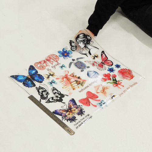 تصویر برچسب اتویی نیم متری پروانه